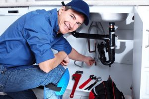 smiling photo of a plumber